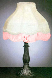 a lamp with some pink stuff on it